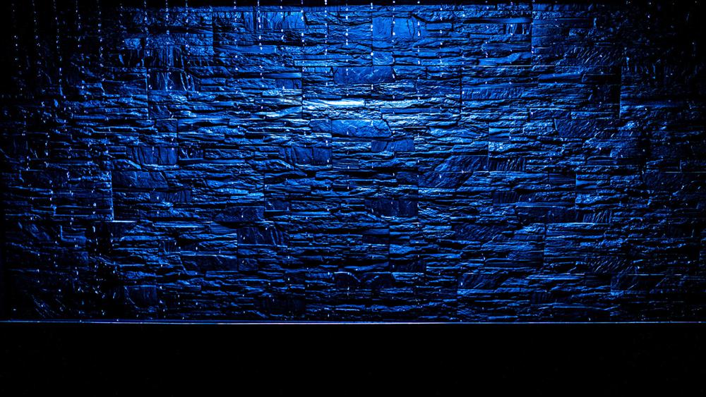 Blue optical wall installation in Berlin illusion museum