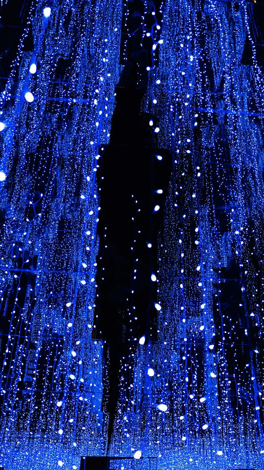 Blue immersive light room at Illusion Museum Berlin